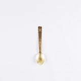 Dian Spoon, Brass